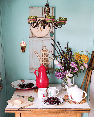 A still-life waiting to happen: flowers, crockery and fruit on Aunt Peg’s table