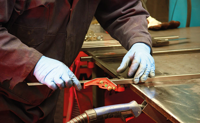 steel components being measured and aligned before welding 