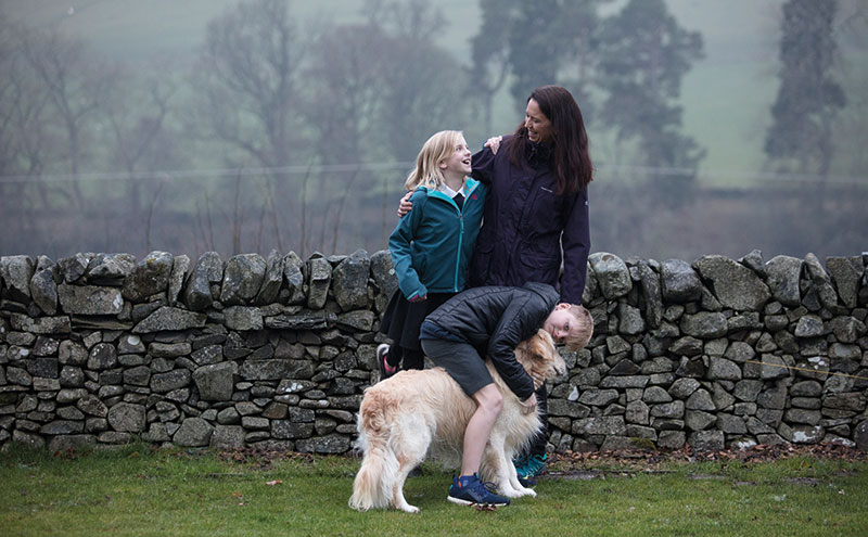 Ruth enjoying a quiet moment with Aiden, Delphine and Murphy