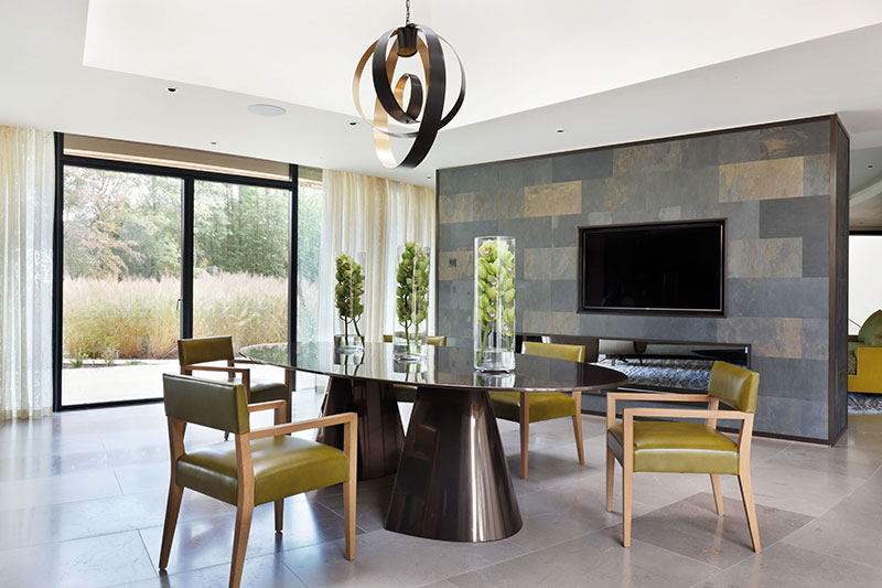 dining room with bronze resin Davidson dining table, with oak chairs