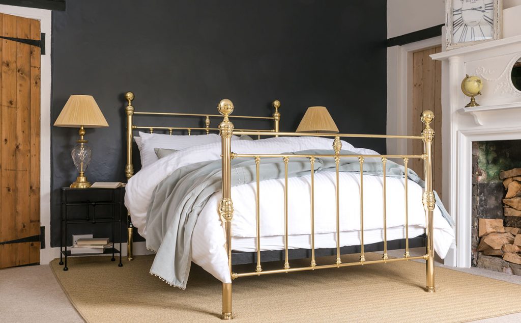Gold bed by the Wrought Iron and Brass Bed Co