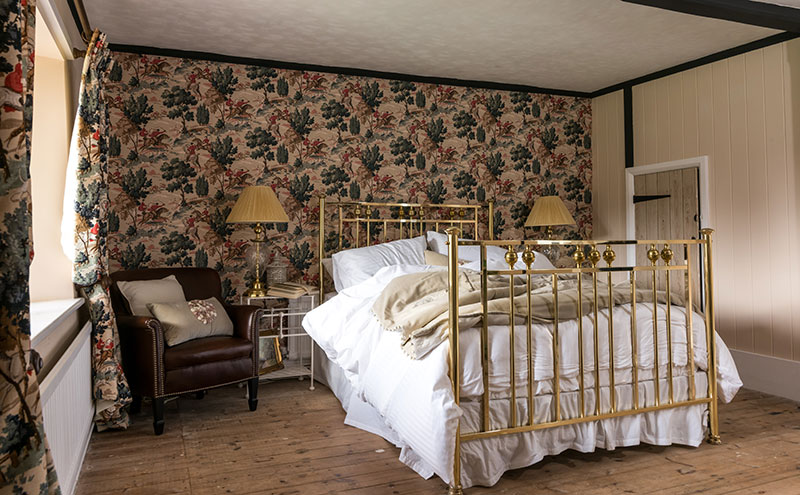 bed by Wrought Iron and Brass Bed Company set up in bedroom