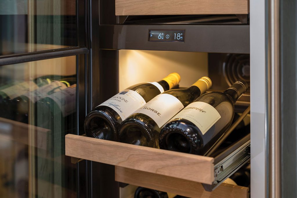 wine-cooler-with-bottles-of-white-wine