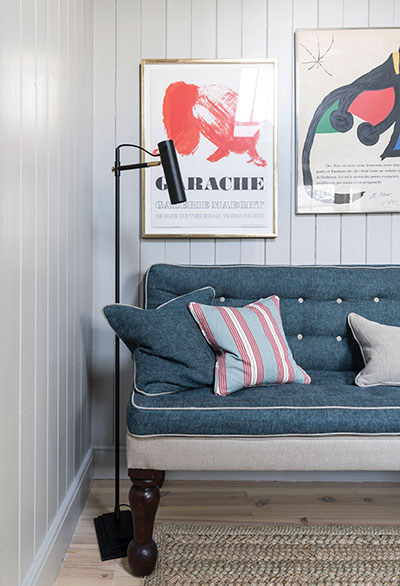 colourful-sofa-and-prints-at-kennels-cottage