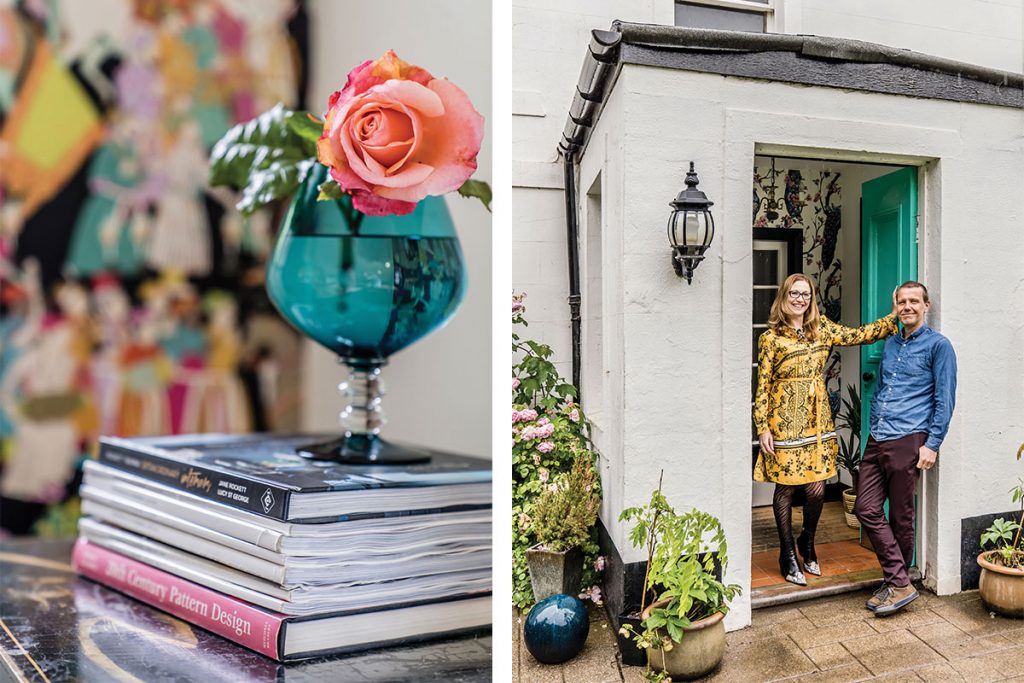 wendy-and-her-husband-standing-outside-the-house-and-cup-of-flowers-on-books