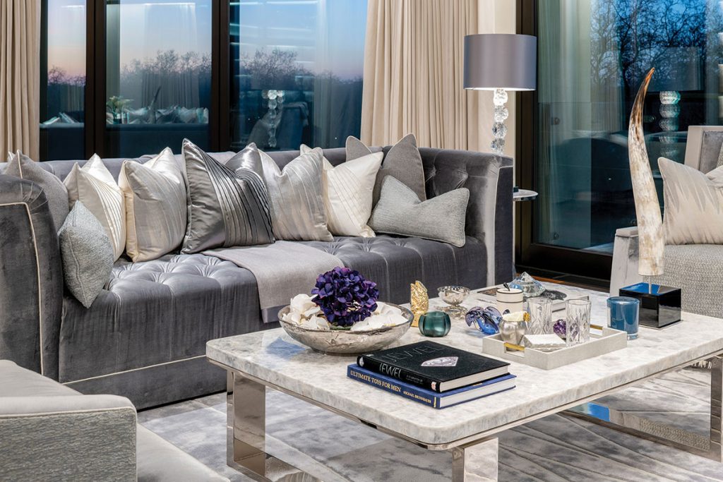 silver-sofa-and-marble-coffee-table-in-living-room