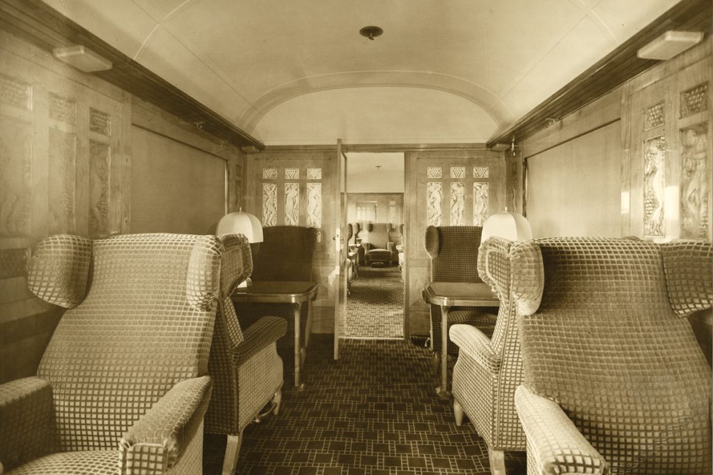 An archive shot on board the Orient Express, which features decorative panels created by René Lalique for the interior of the train. [Bottom right] A closer look at one of the panels, a design entitled Femme tête levée. It is still in production today