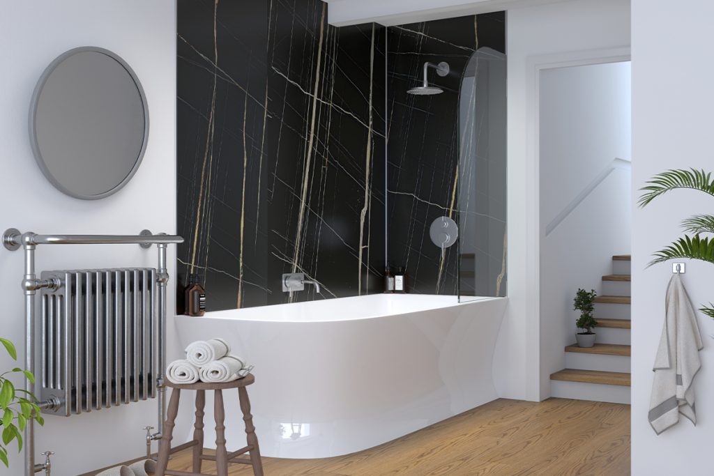 Black marble effect laminate wall panel with oak effect click vinyl flooring in bathroom 