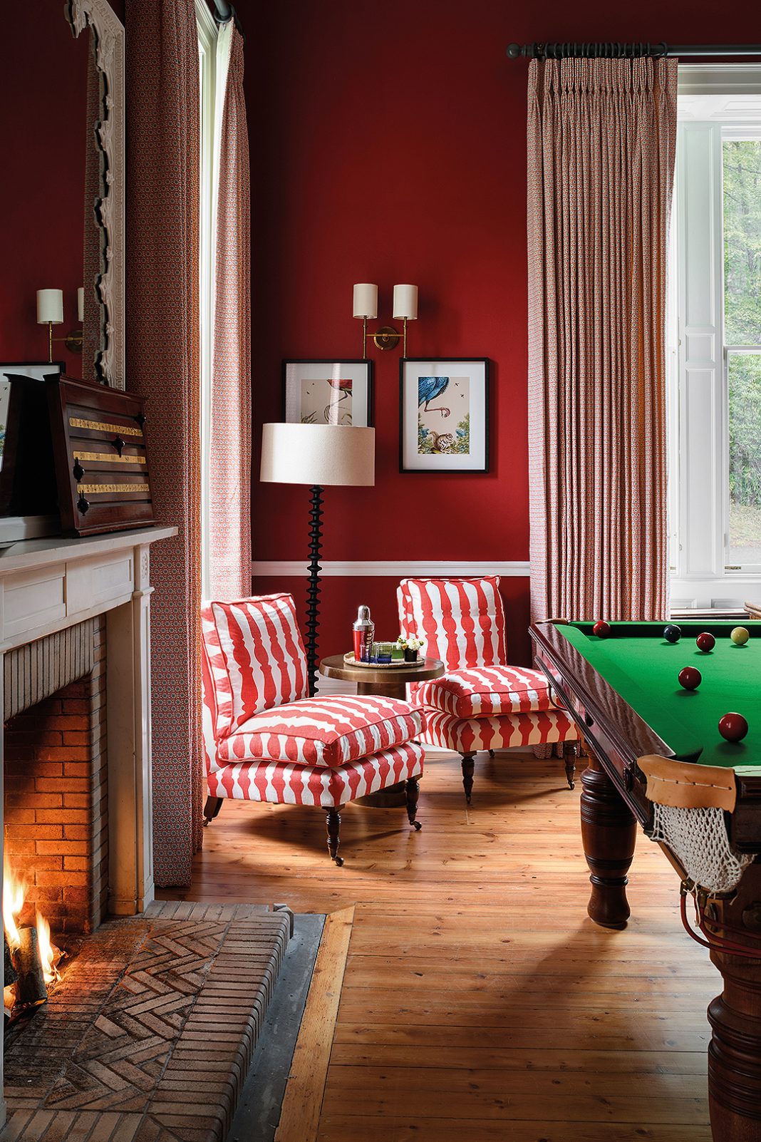 games room, billiard table, snug, family room. Red, checked chairs, original fireplace