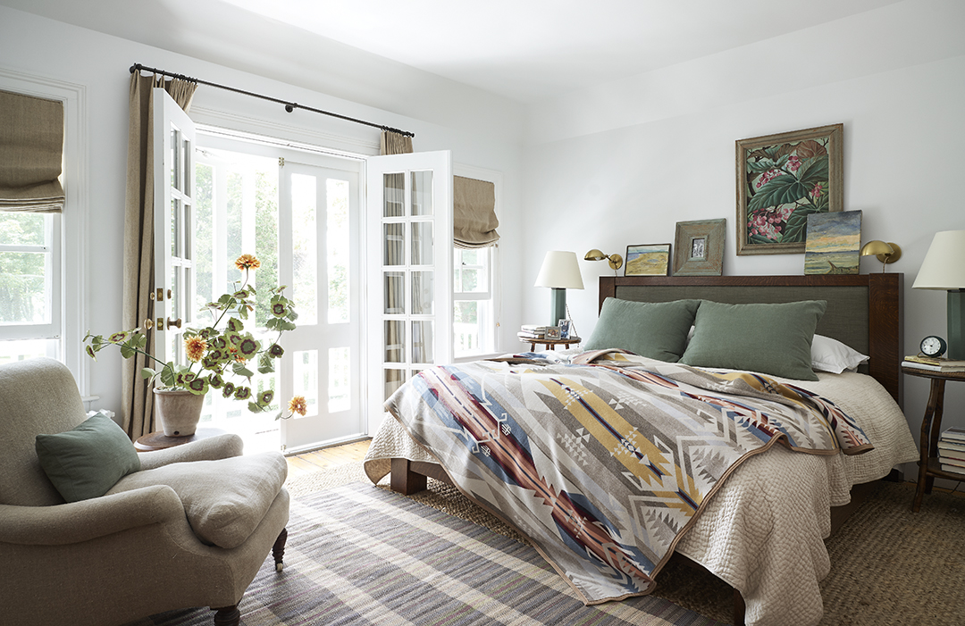 bedroom with doors open to outside 