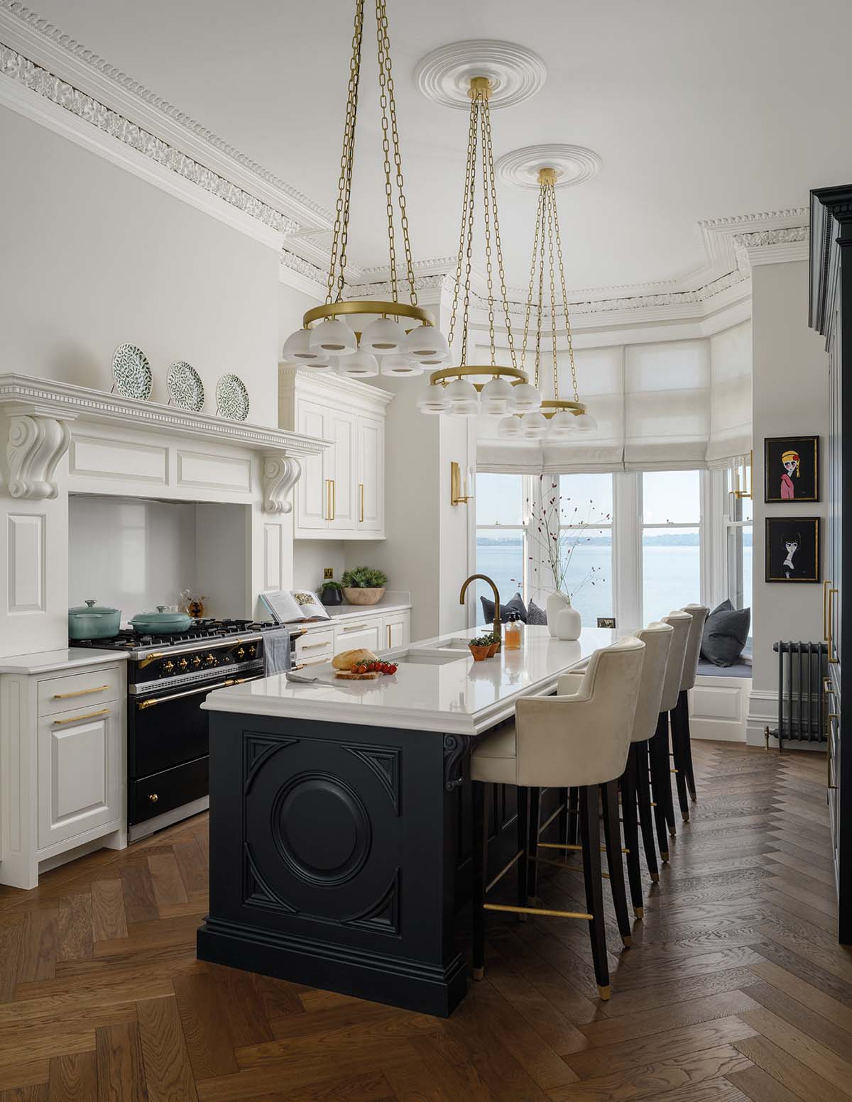 kitchen view. large island and pendant lights