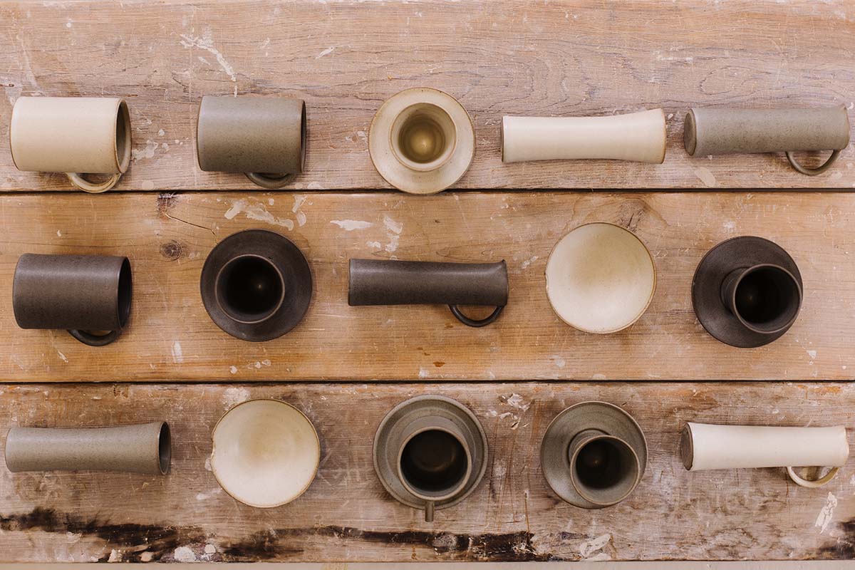 A selection of pottery on a wooden floor