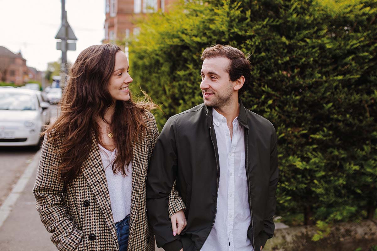 Scottish Ballet's principal dancers Bruno and Roseanna walking together in Glasgow.