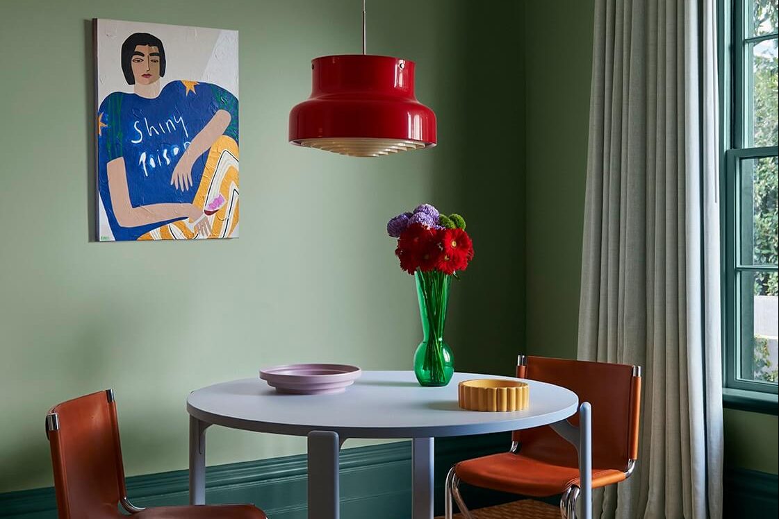 Unexpected red lampshade and flowers 