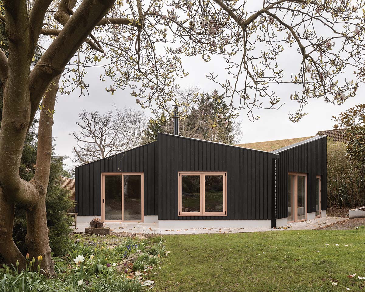 A black wood clad home by Oliver Leech