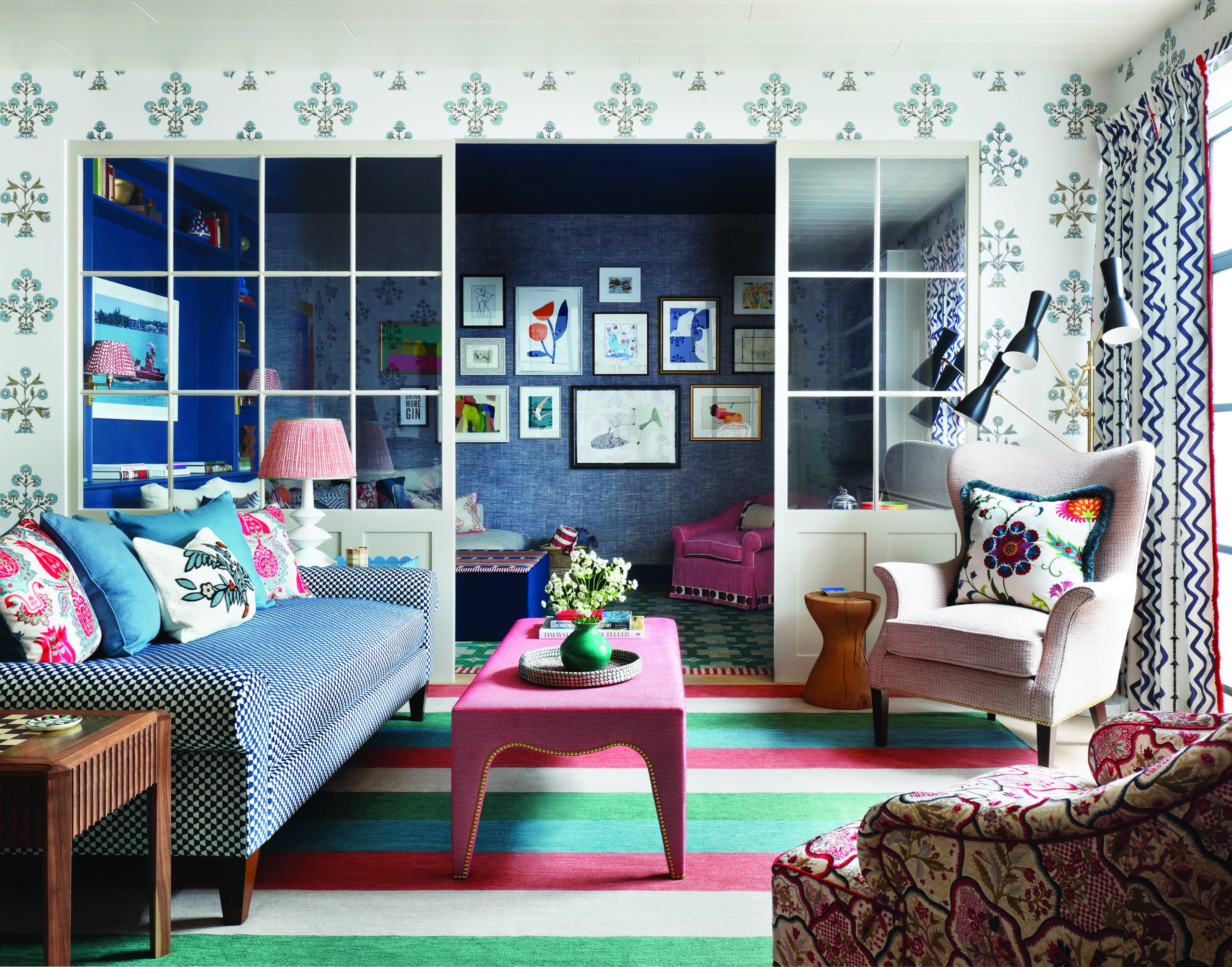 A bright and colourful living room with lots of pattern