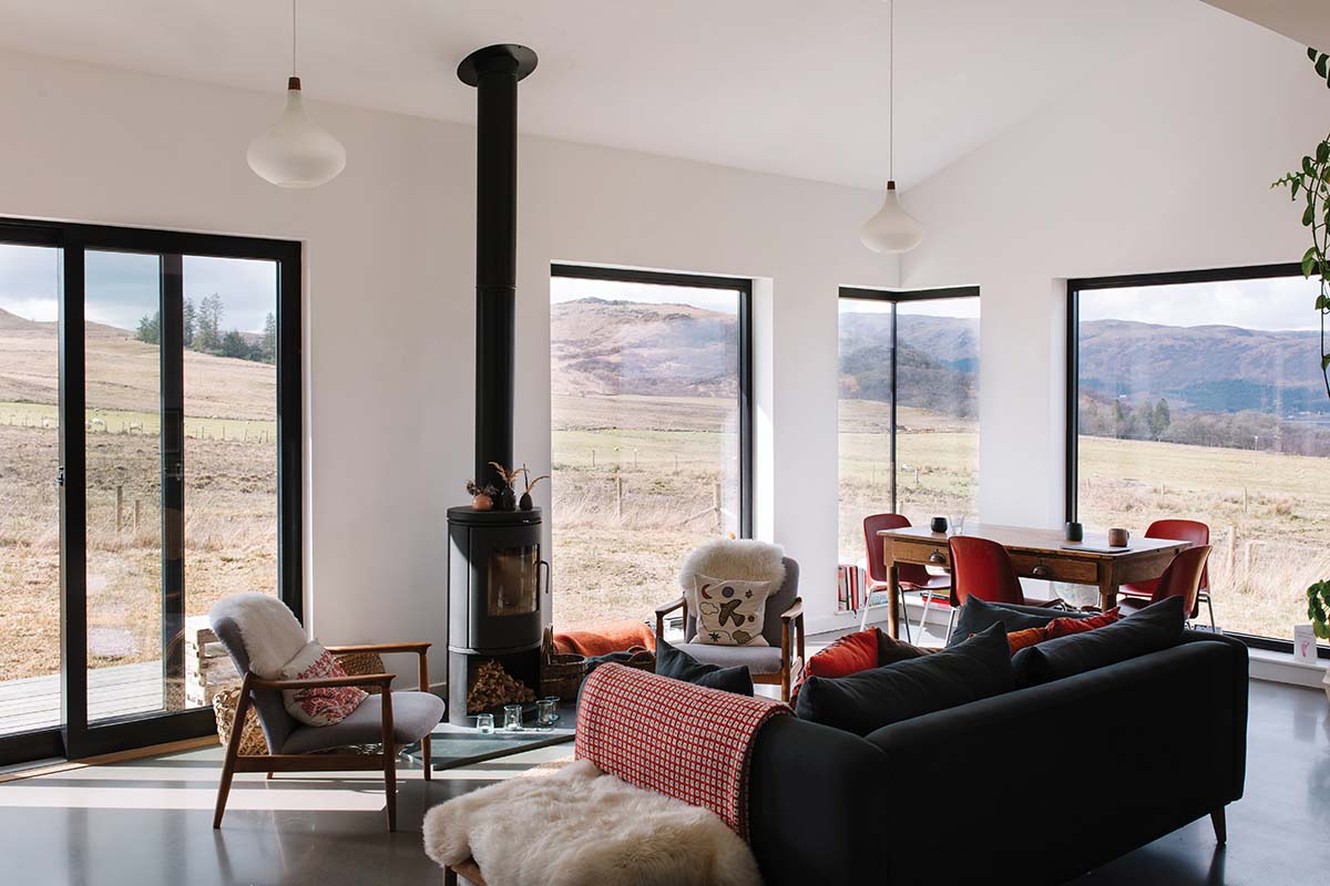 Pam Burton's home features wall-to-wall windows, giving her views to the surrounding Scottish hills and wildlife.