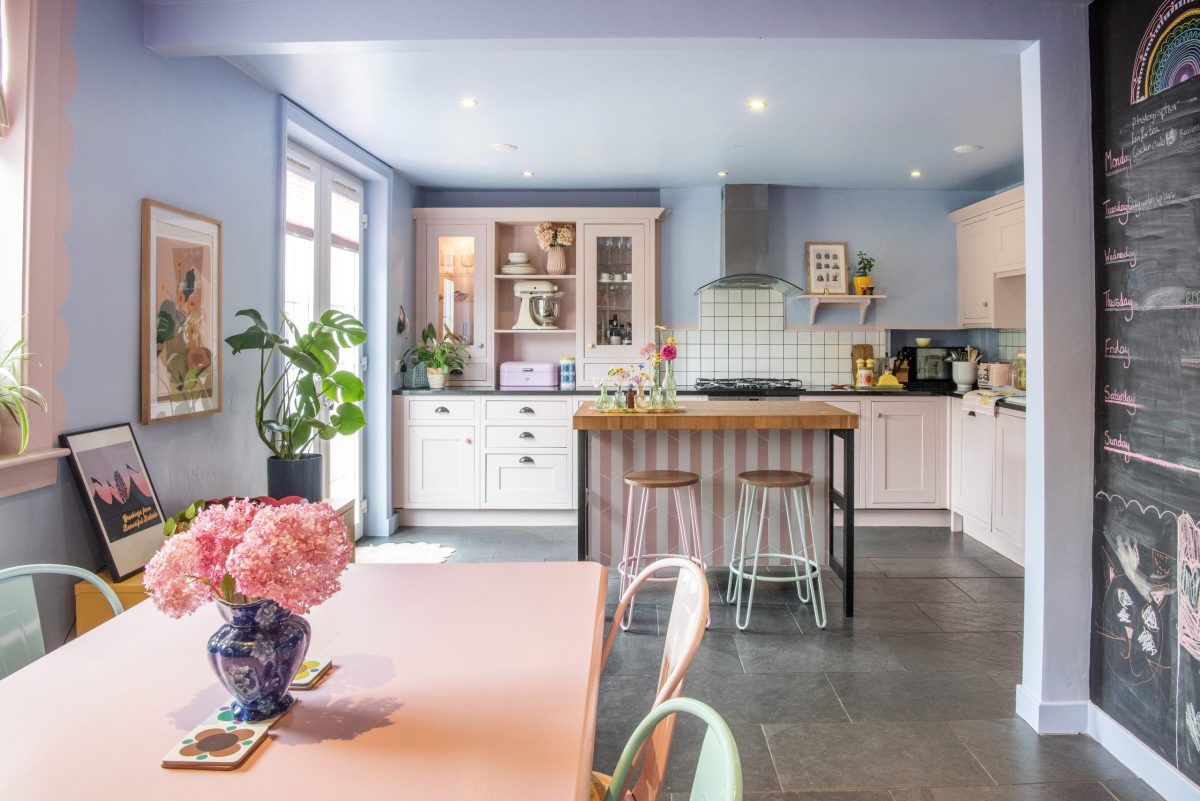 In episode 6 of Scotland's Home of the Year 2024, we visit The Pink House. This is the kitchen and dining area, packed with colour and flowers.