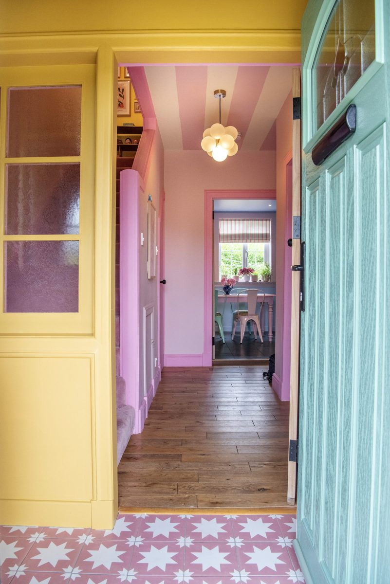 In episode 6 of Scotland's Home of the Year 2024, we visit The Pink House. This is the colourful hallway with star-shaped pink tiles and a blue door.