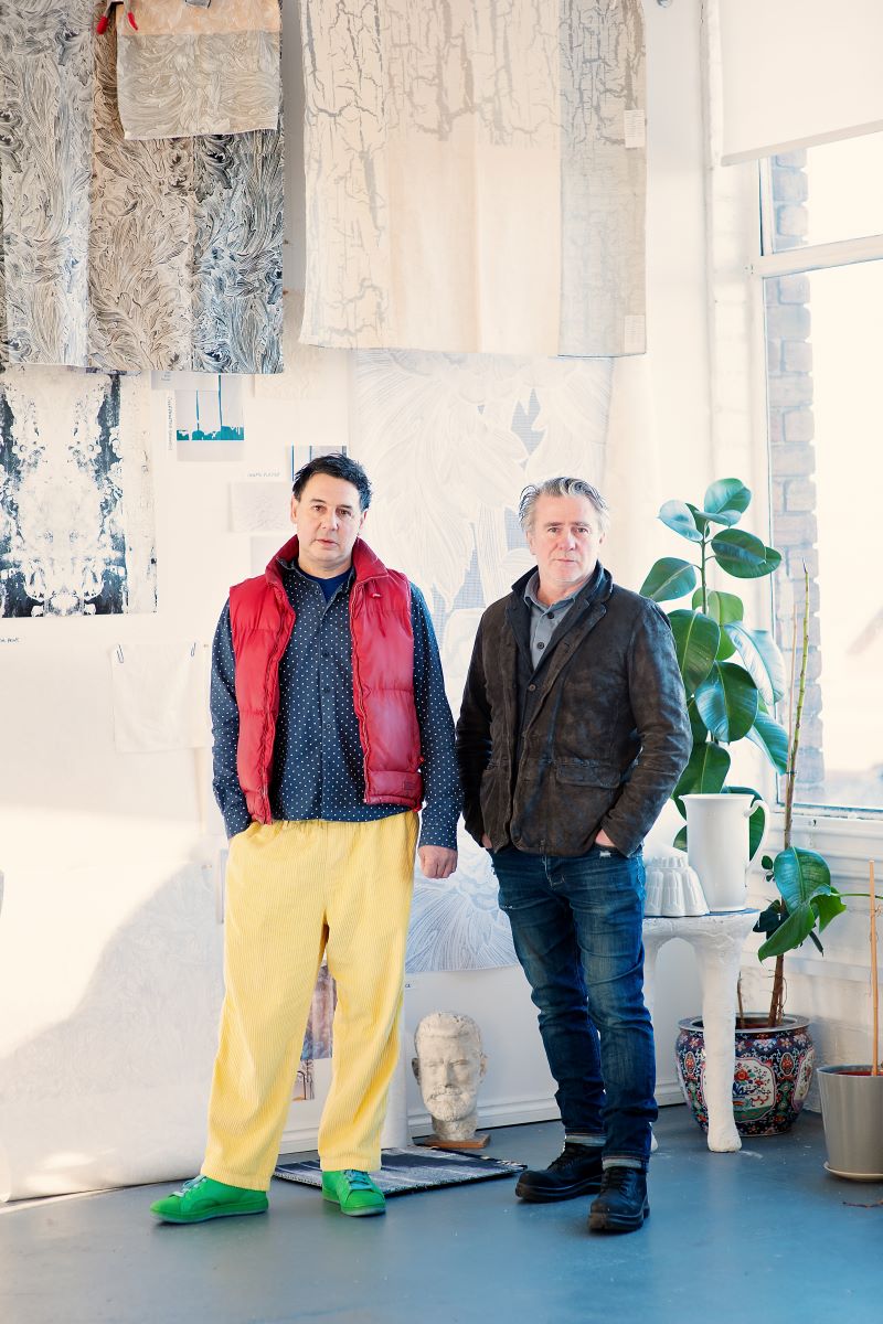 Paul Simmons and Alistair McAuley, founders of Timorous Beasties stood in front of Stucco collection
