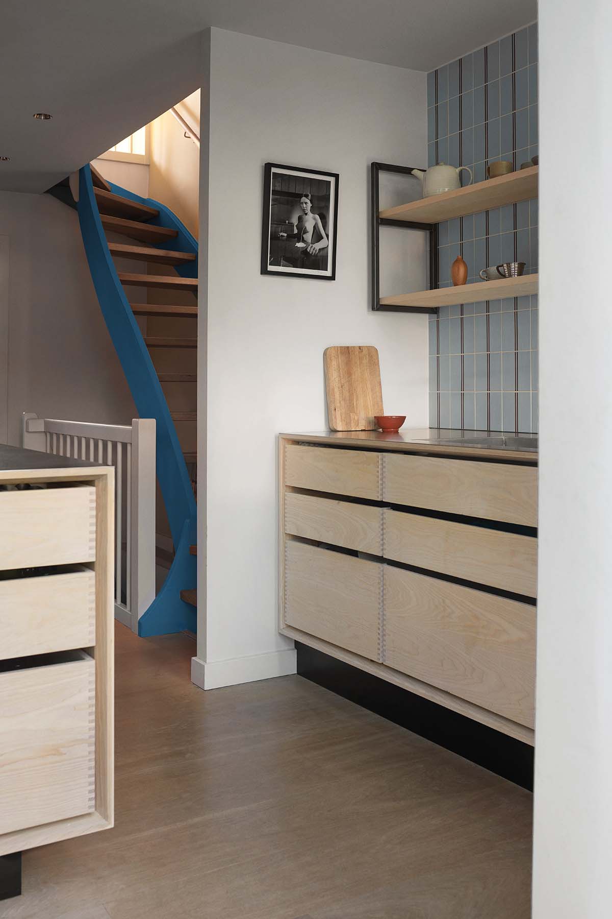 Kitchen food prep area, with wood cabinetry featured in a bespoke Garde Hvalsoe design