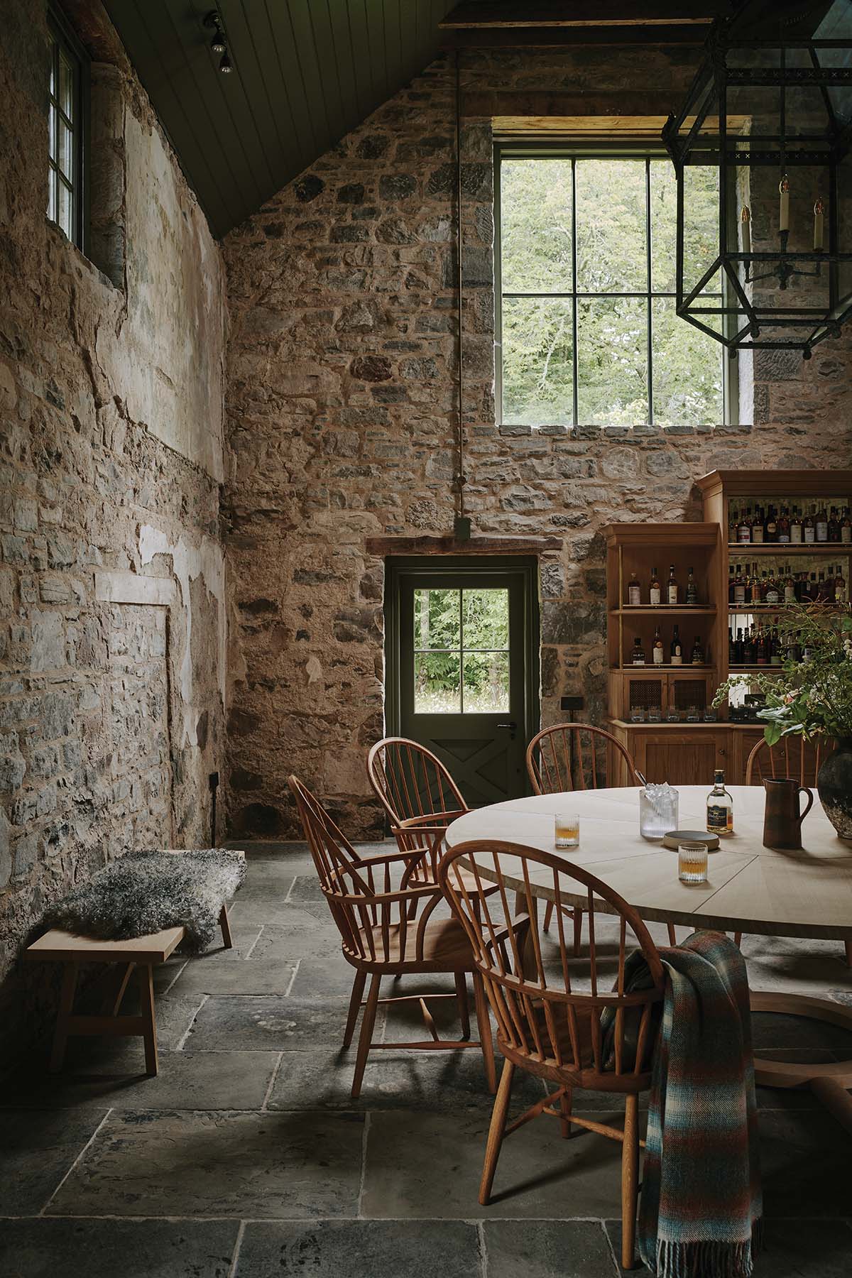 Dining area, cosy in the old stone barn at a castle in Scotland