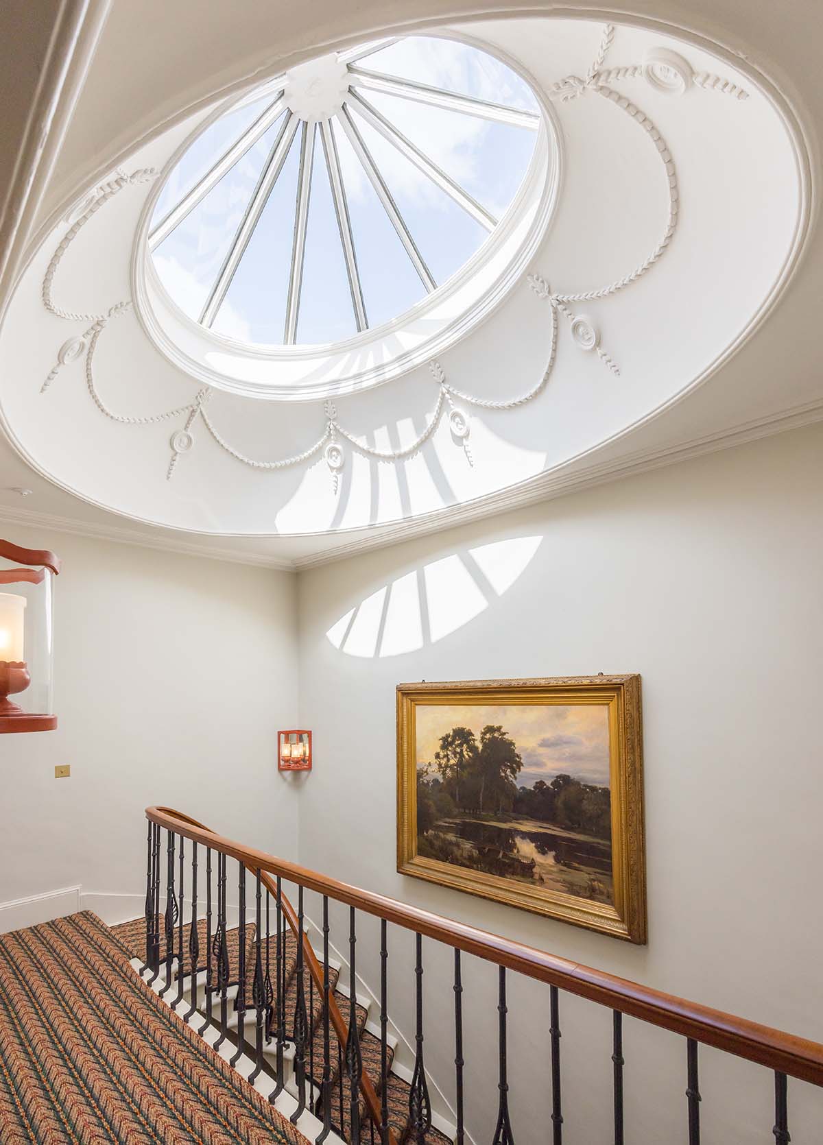 skylight at the top of winding staircase