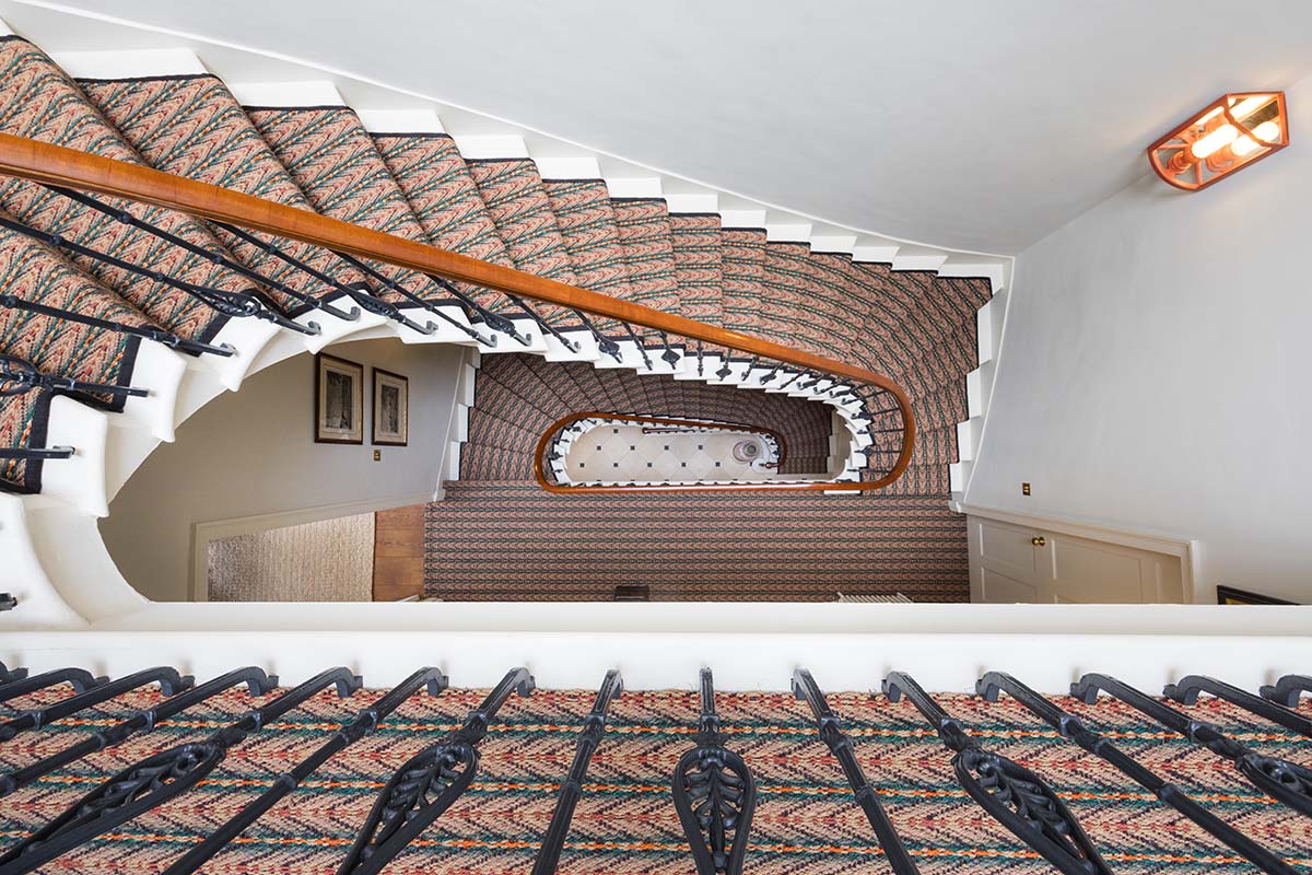 winding staircase with patterned carpets in edinburgh 