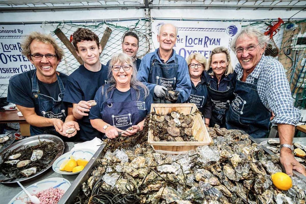 group of people eating oysters at stranraer oyster festival