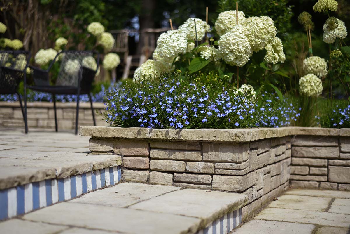 patterned tiles on step in a glasgow garden 