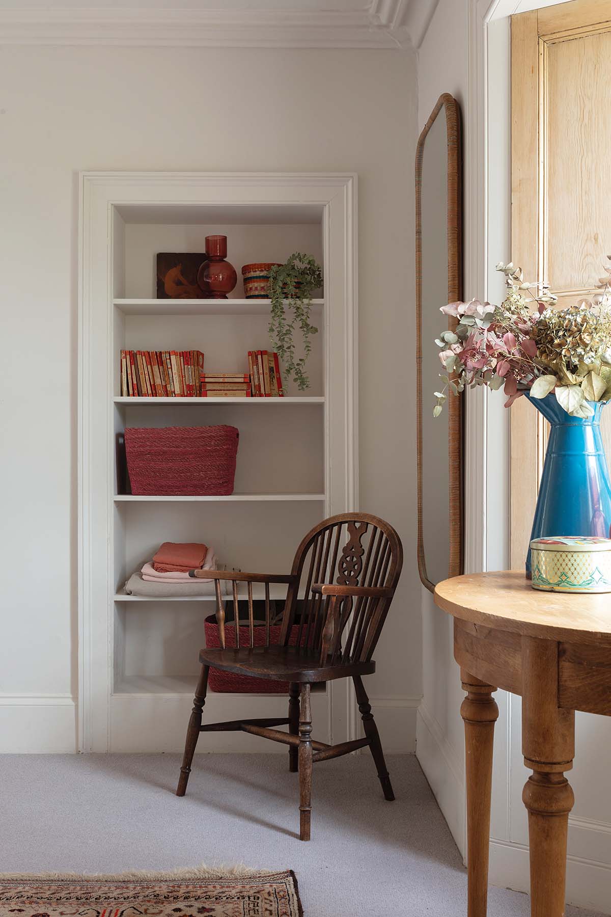 bookcase and seat by the window in perth cottage in scotland