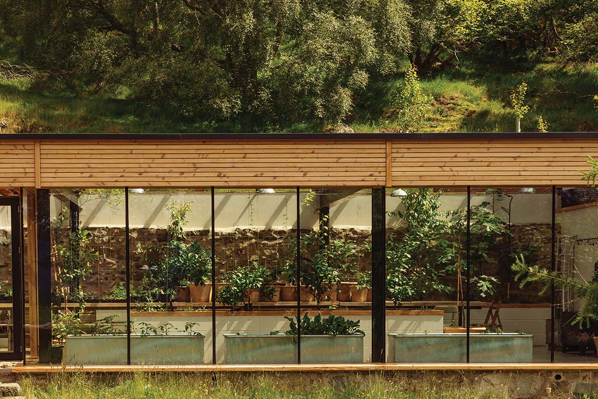 moxon architects aberdeenshire house with greenhouse and glass potting area - this image is for the shortlist of the RIAS 2024 best building in scotland award