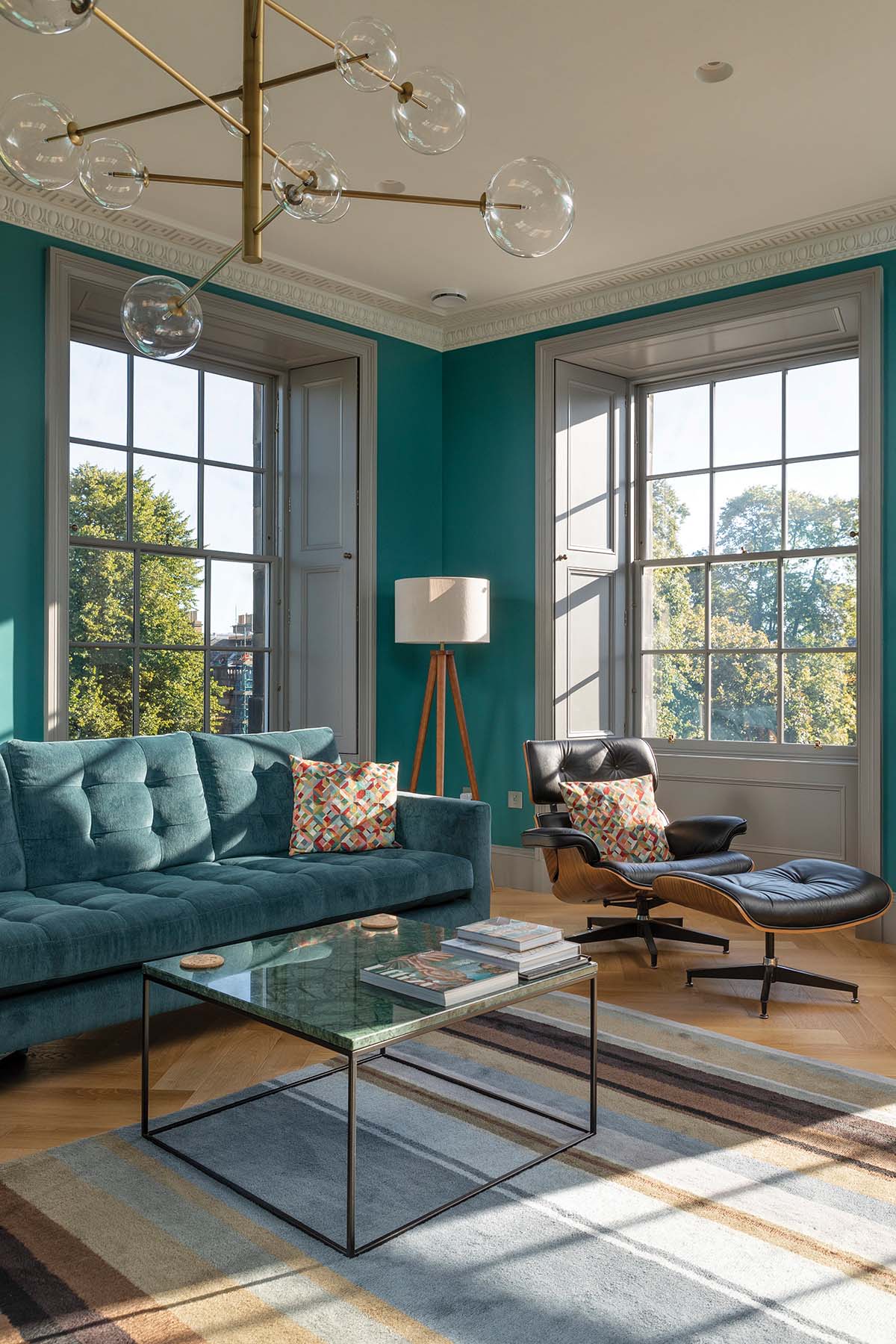 blue lviing room in edinburgh georgian apartment by john jeffrey and photographed by alix mcintosh