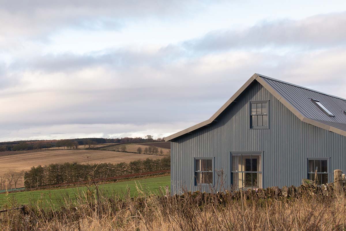 dapple photography image of the exterior honeyberry house, a project in scotland by architects at building workshop