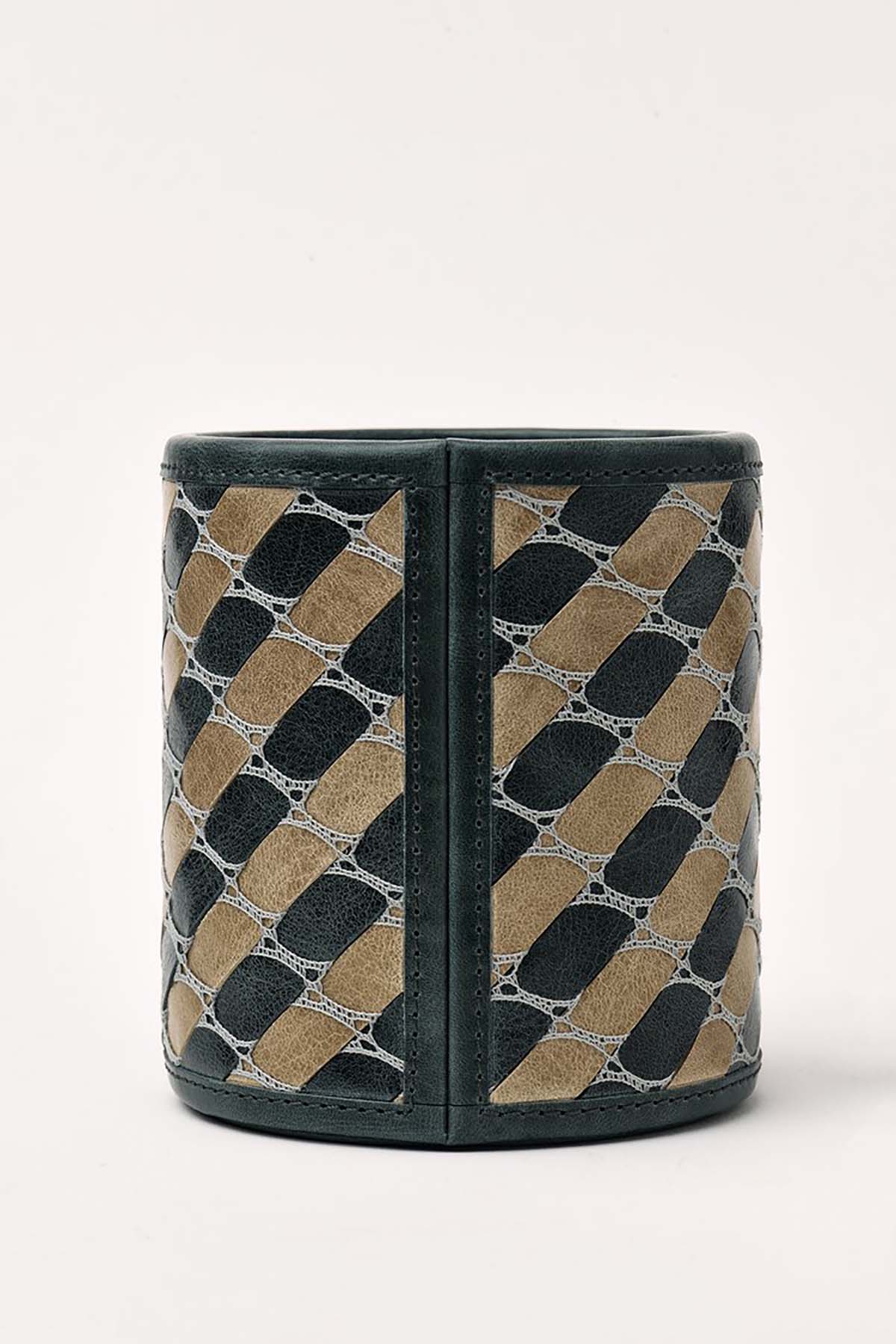 Iseabal Hendry 'Poit' handwoven leather pot, £275 - christmas luxury gift guide for the home