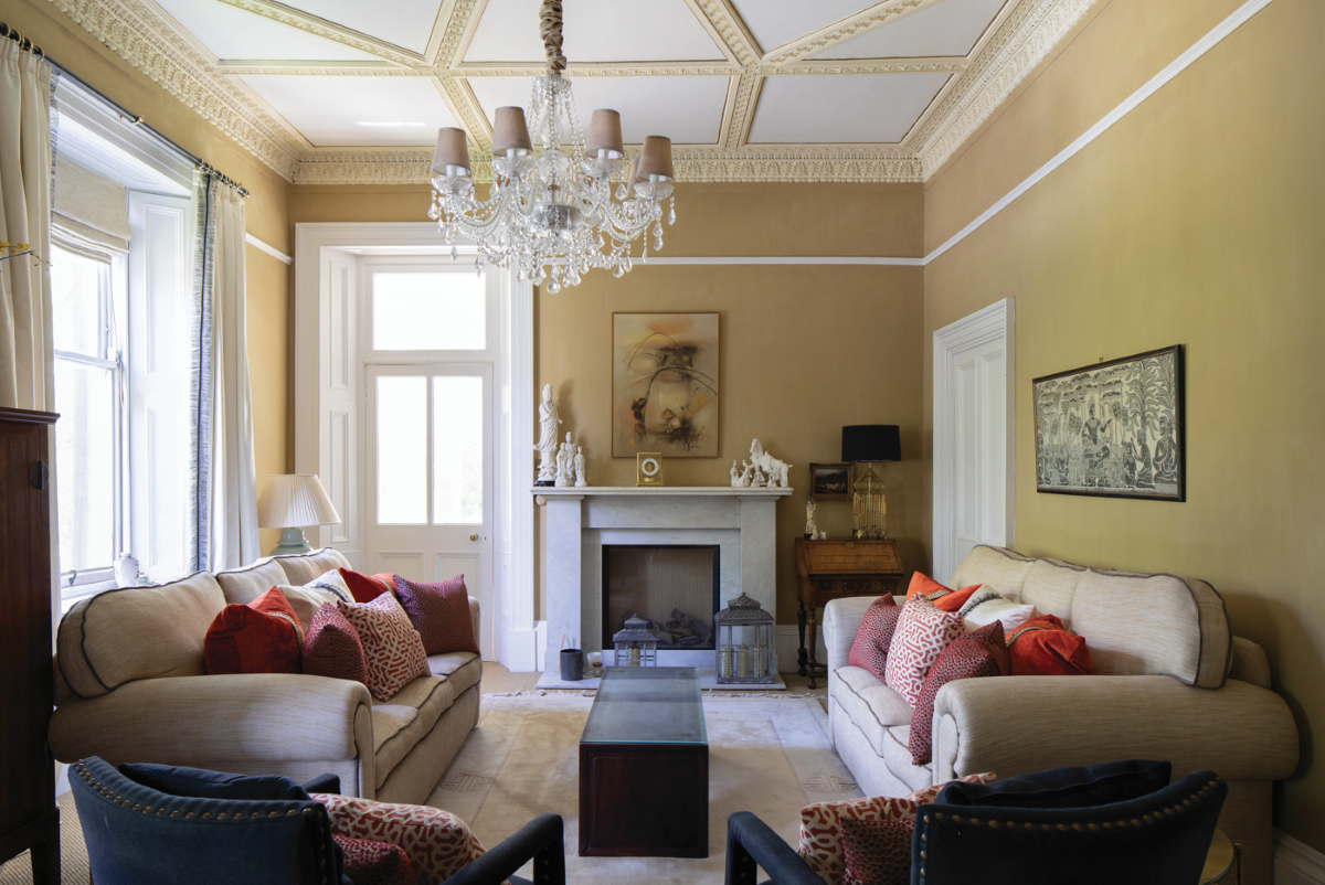 lviing room regal and yellow in a 200-year-old villa in edinburgh