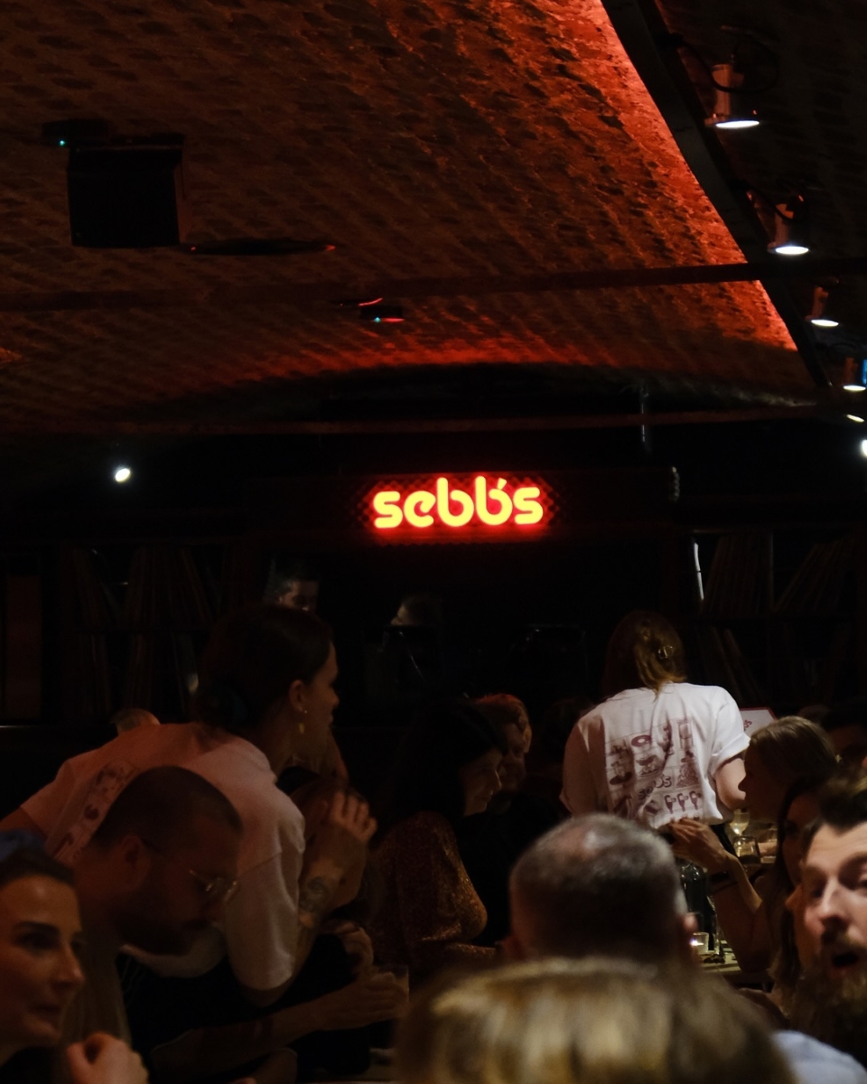 sebb's new bar and restaurant and glasgow featuring dimly lit interiors that hark nto european music bars of the 50s