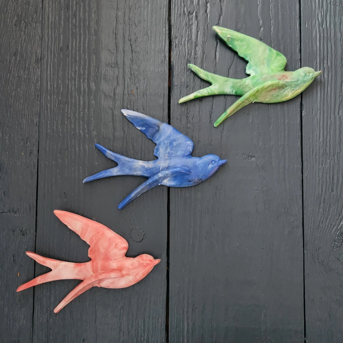 Anna Campbell Jones and Ocean Plastic Pots create a swallow design for the home based on Anna's iconic hand tattoos