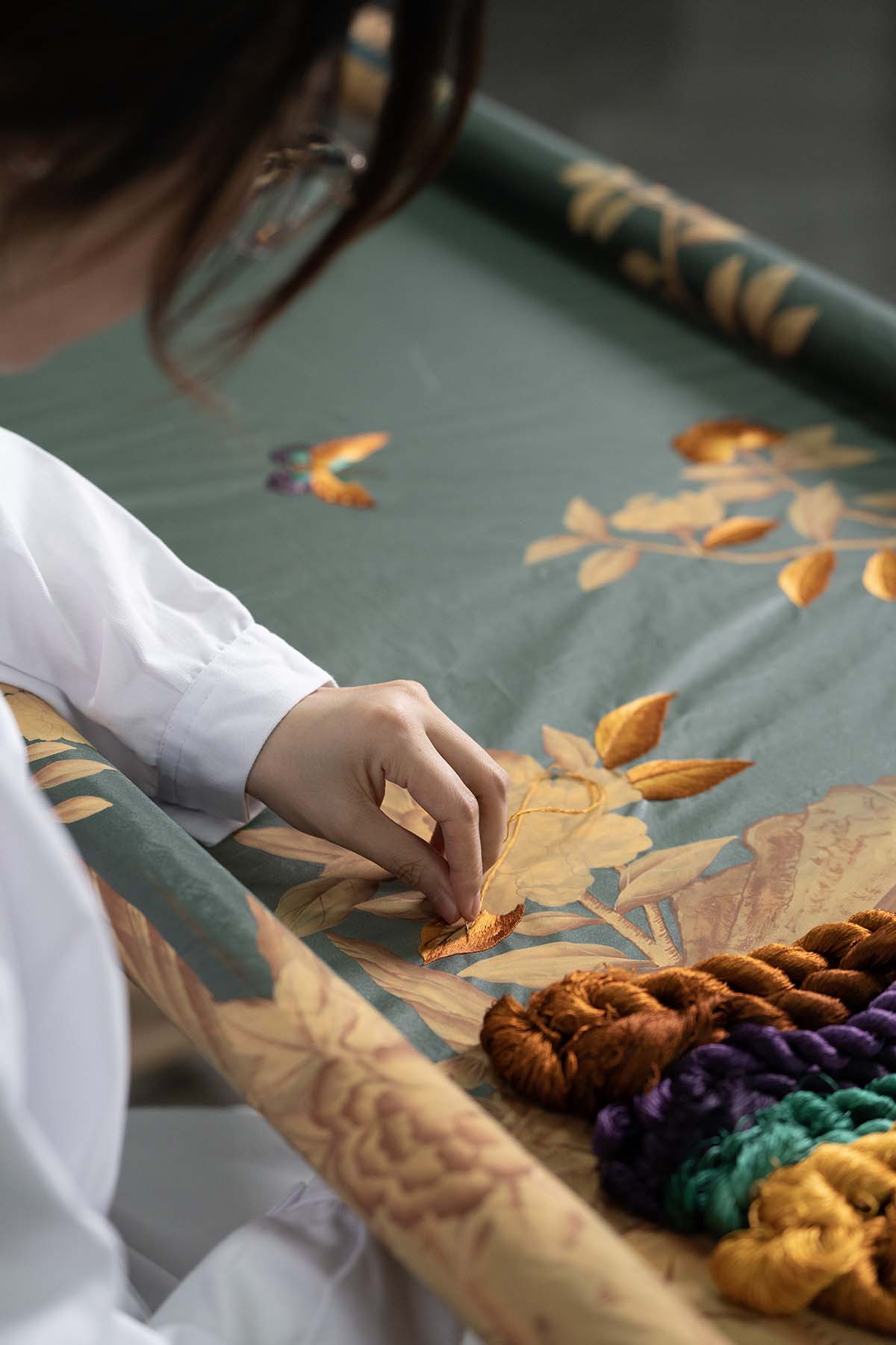Fromental's craftspeople follow the same intricate process of hand-embroidery