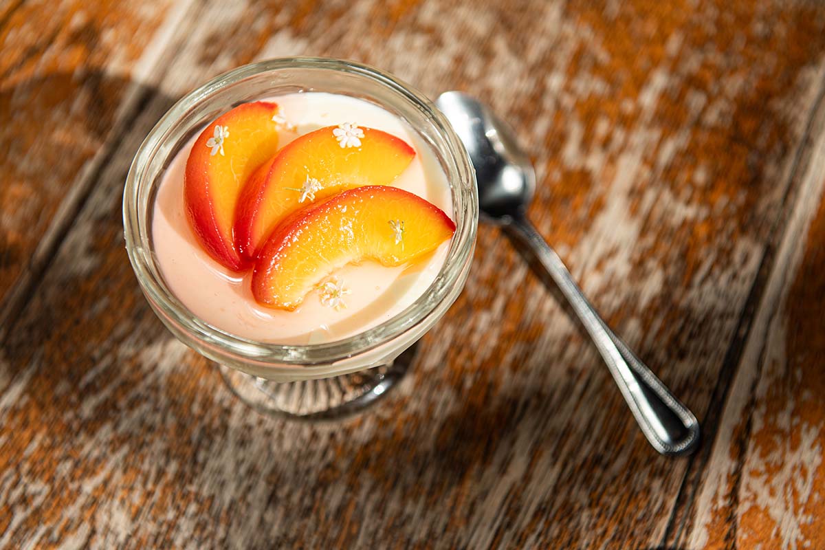Elderflower panna cotta and roast nectarine summer recipes by head chef at the palmerston