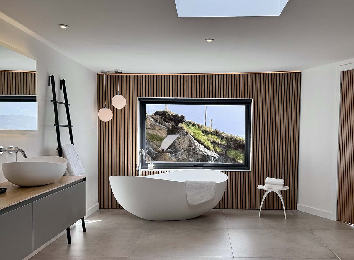 Riluxa’s Ocean bath, renamed in honour of Harris Hideaway, takes centre stage. The timber cladding is by WoodUpp and the tiles are from Alexander & Sancto