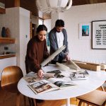 Katie and Jordan Laird, co-owners of Studio Something, making moodboards for family portraits and future projects