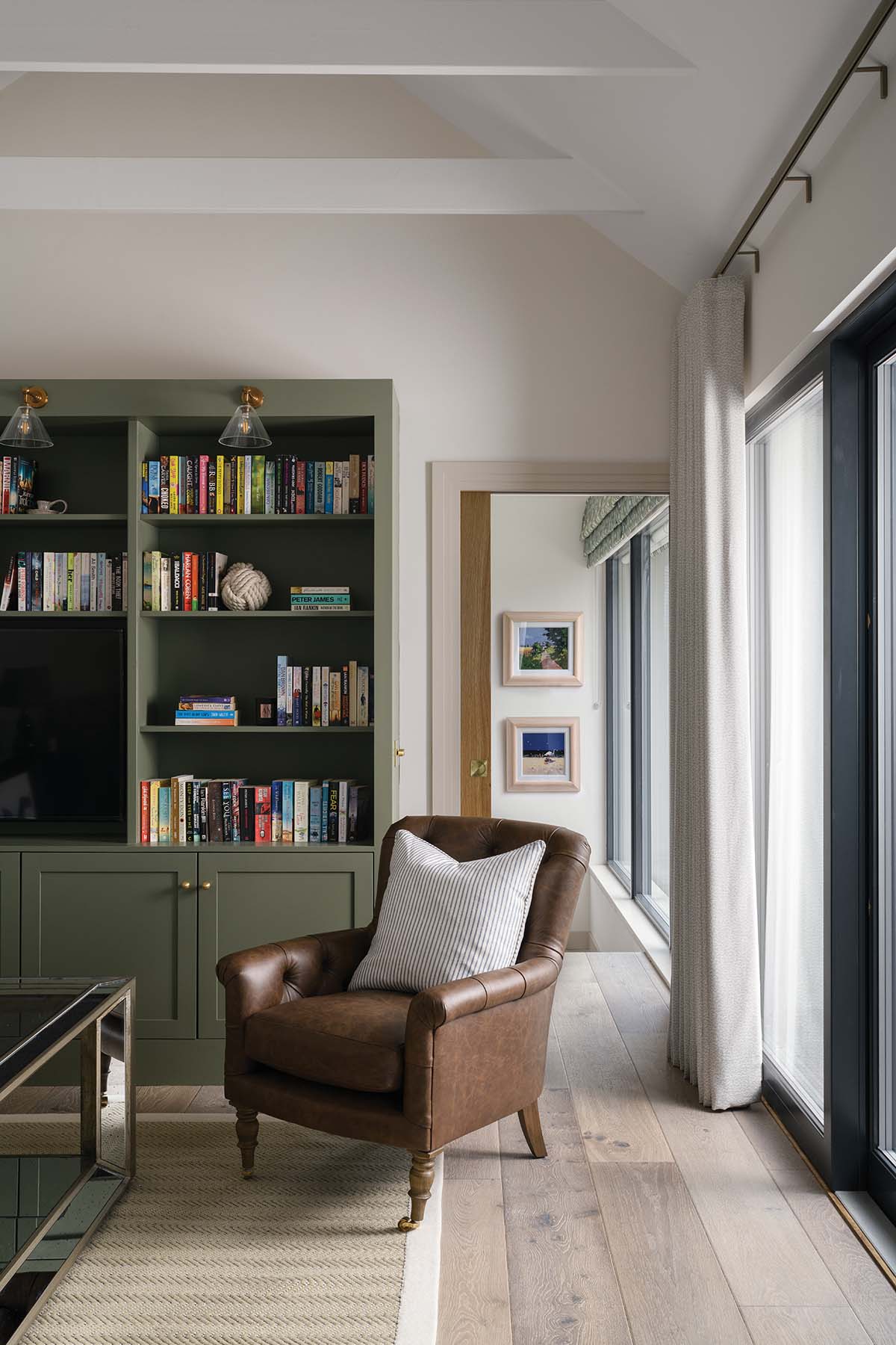 The vintage colour-coordinated books were supplied by Country House Library in this elie holiday home in fife