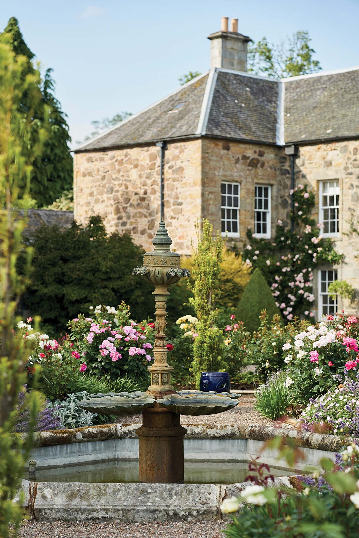 Balcarres Estate rear garden with pond and stone fountain