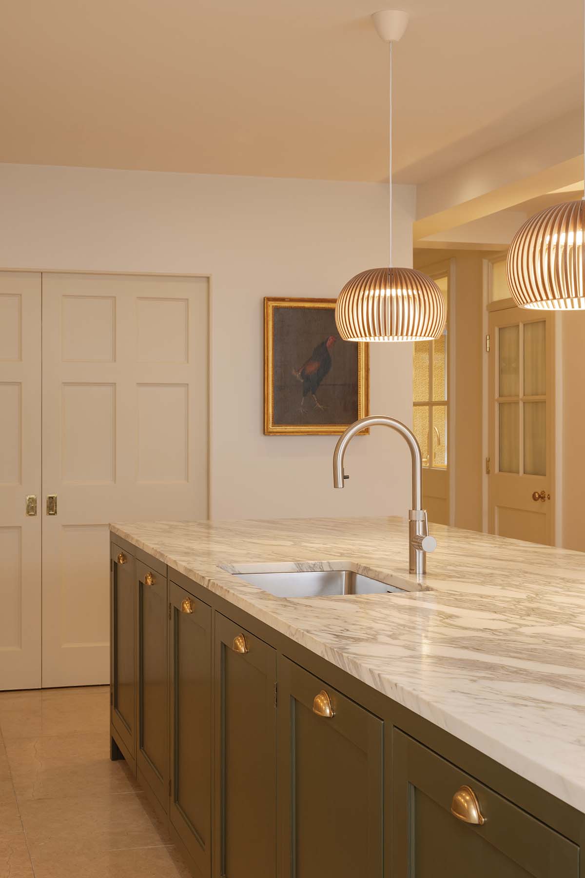 warm kitchen by cameron interiors