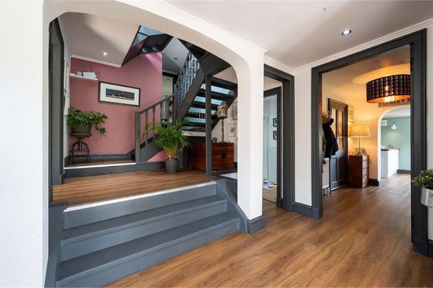 high-end homes for sale in Orchard Wood; pink and black hallway in a contemporary home for sale with espc in scotland