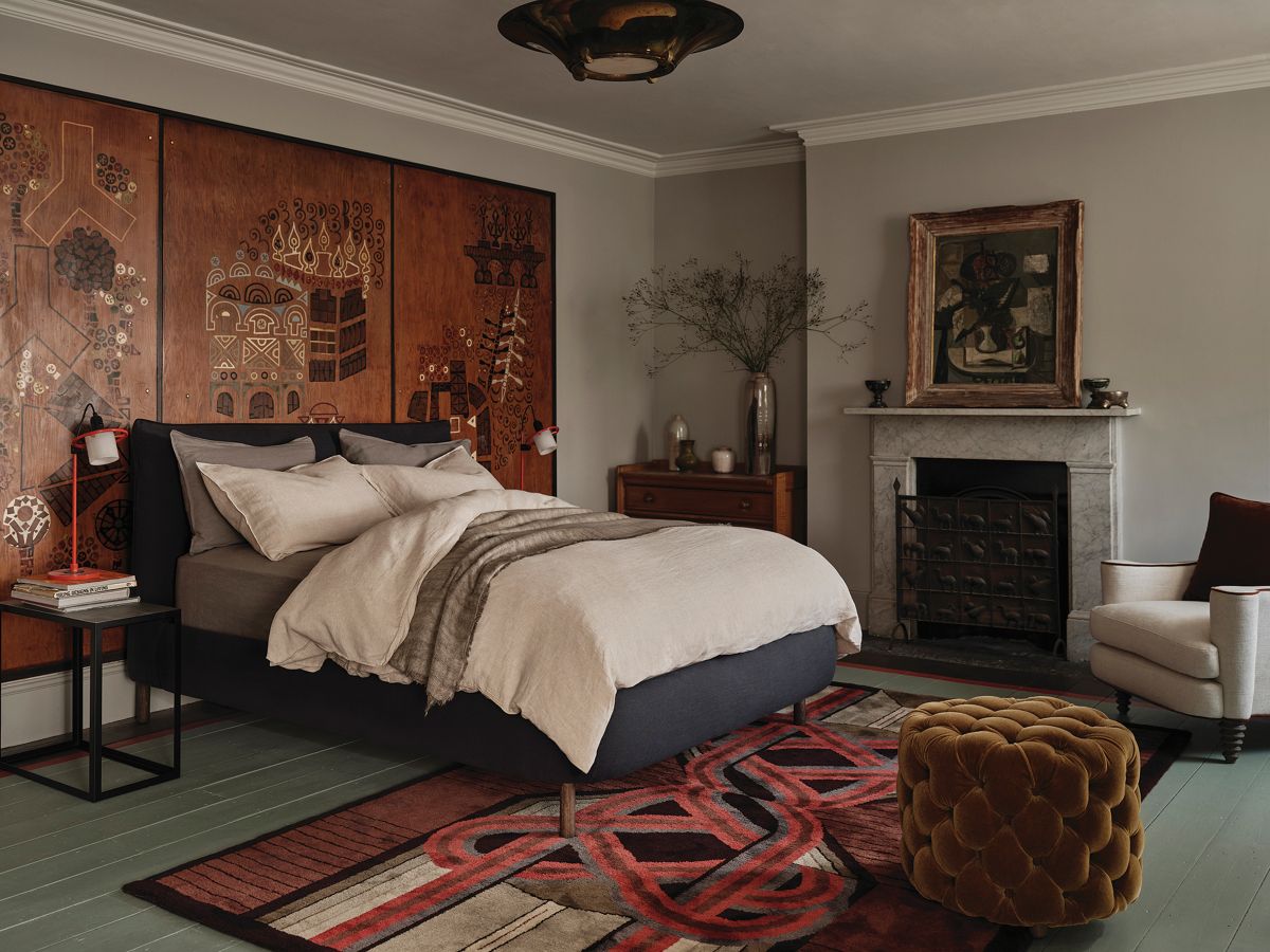 moody interior design, with gothic bedroom design, red wall paint, jute rug ideas, fireplace