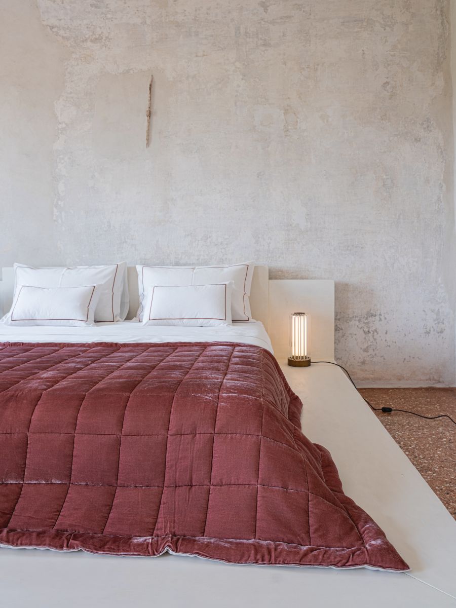 sleek bedroom in the Once Milano quilt, box stitch, velvet, vintage pink, pillowcase, topsheet, white, inset piping, bordeaux, Once Milano