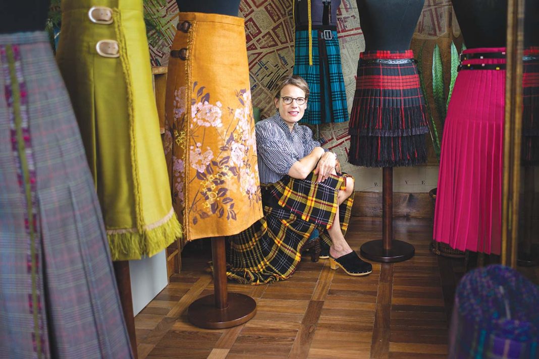 Andrea Chappell in her studio of kilts in scotland - kilt maker