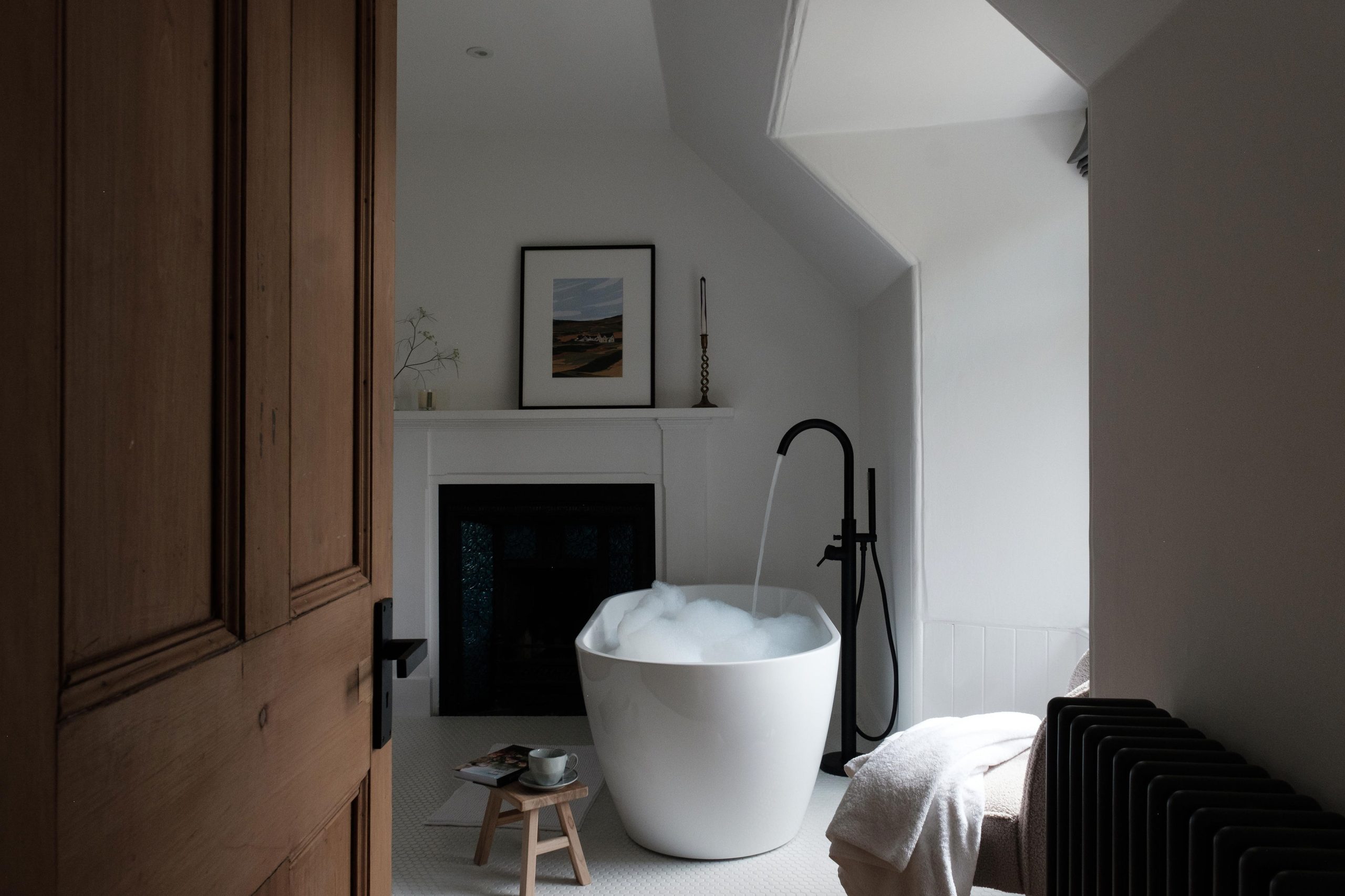 Freestanding bath with Laura Thomas Co. bubblebath in the Farmhouse room